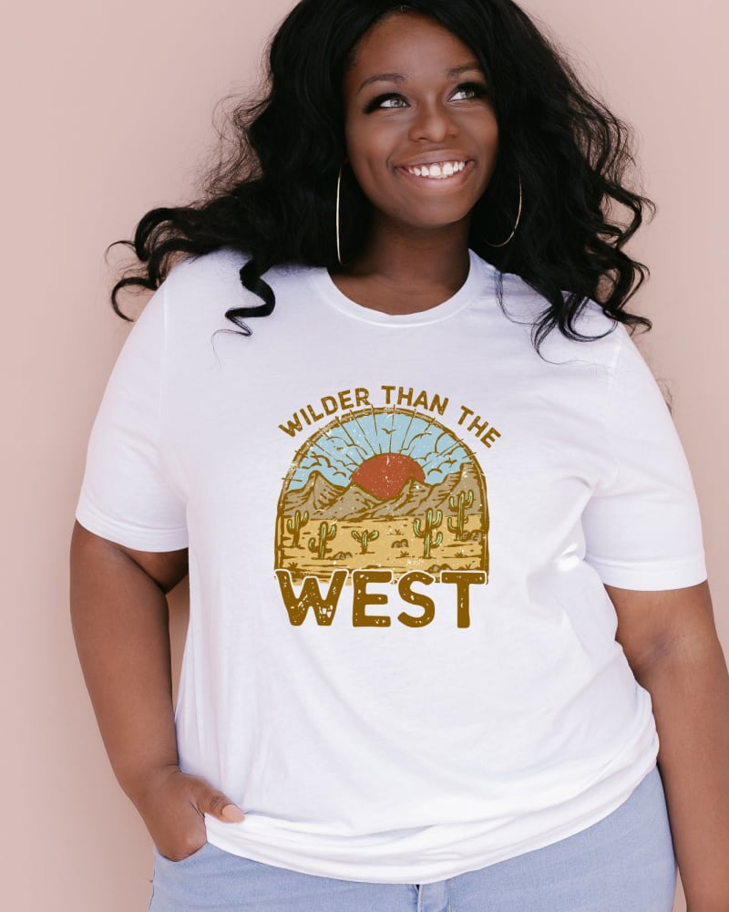 Front of a model wearing a size XL Wilder Than The West in White by Simply Sage Market. | dia_product_style_image_id:281646